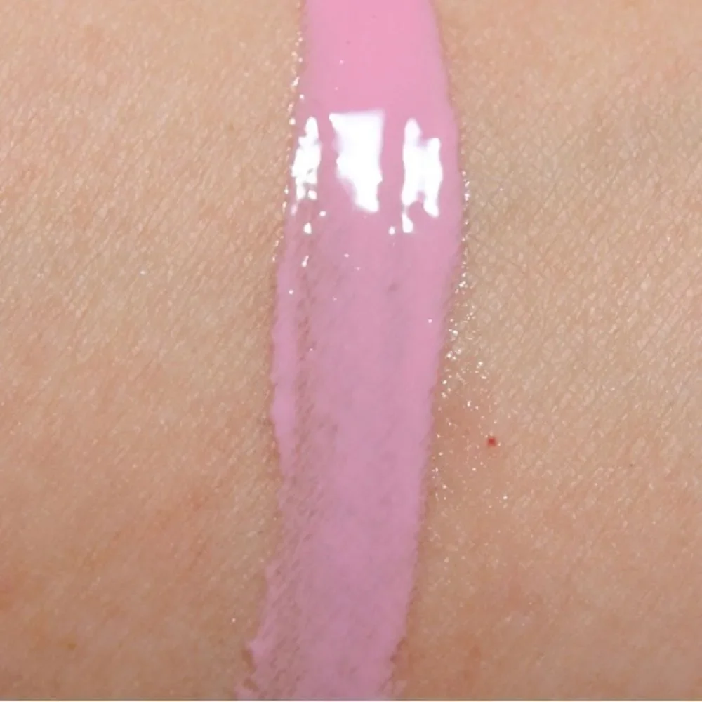 NIB MAC Archie’s Girls Lipglass in “Stay Sweet”